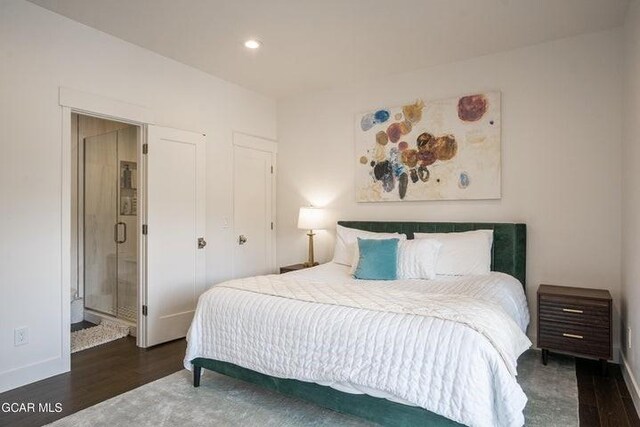 671 Vasquez Rd, Winter Park, CO 80482 - bedroom with wood finished floors, recessed lighting, baseboards, and ensuite bath
