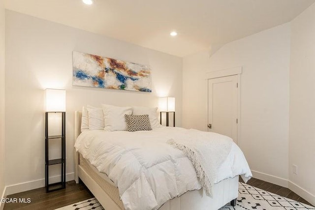 671 Vasquez Rd, Winter Park, CO 80482 - bedroom with baseboards, recessed lighting, and wood finished floors
