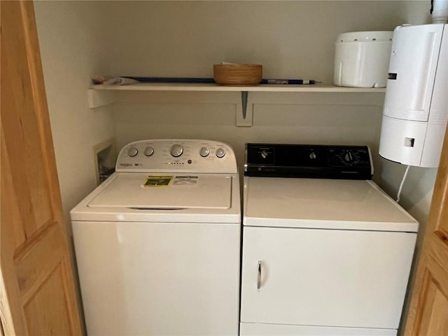 2300 Apres Ski Way Unit 12, Steamboat Springs, CO 80487 - laundry area with washer and clothes dryer