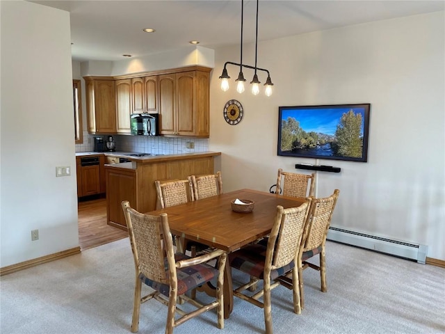 2300 Apres Ski Way Unit 12, Steamboat Springs, CO 80487 - dining space with a baseboard heating unit, light colored carpet, baseboards, and recessed lighting