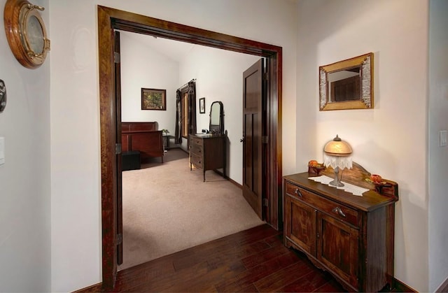 27 Habitat Ct, Dillon, CO 80435 - corridor featuring dark wood-type flooring and lofted ceiling