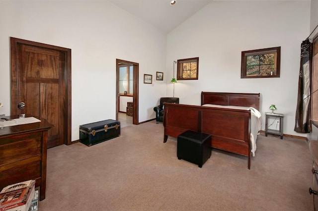 27 Habitat Ct, Dillon, CO 80435 - bedroom featuring light colored carpet, high vaulted ceiling, and baseboards