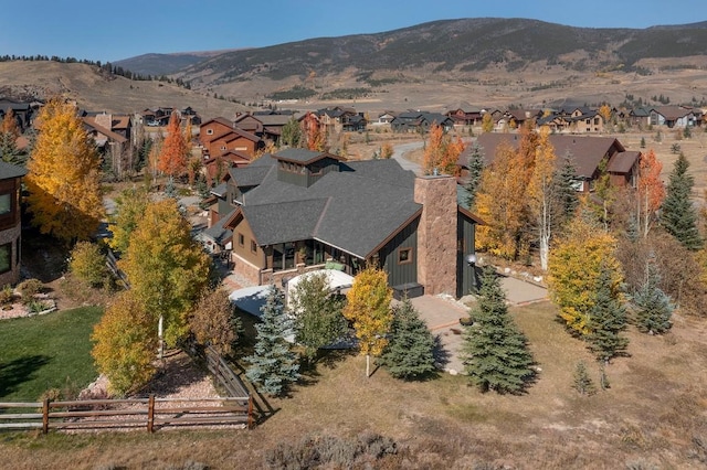 27 Habitat Ct, Dillon, CO 80435 - aerial overview of property's location with nearby suburban area and a mountain backdrop