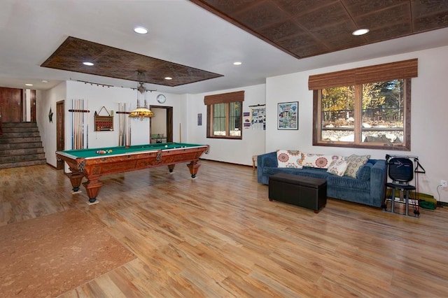 27 Habitat Ct, Dillon, CO 80435 - playroom with light wood-style flooring, pool table, plenty of natural light, a tray ceiling, and recessed lighting