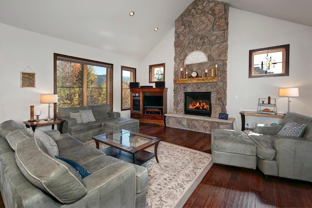 27 Habitat Ct, Dillon, CO 80435 - living room featuring wood finished floors, a fireplace, high vaulted ceiling, and recessed lighting