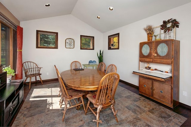 27 Habitat Ct, Dillon, CO 80435 - dining space featuring lofted ceiling, dark wood-style flooring, baseboards, and recessed lighting