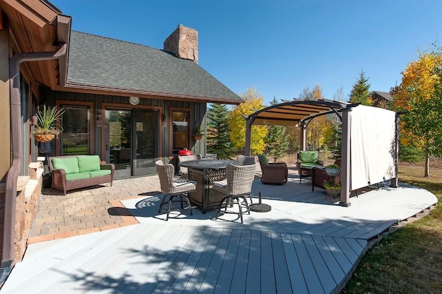 27 Habitat Ct, Dillon, CO 80435 - view of patio with an outdoor hangout area, a wooden deck, a pergola, and outdoor dining space