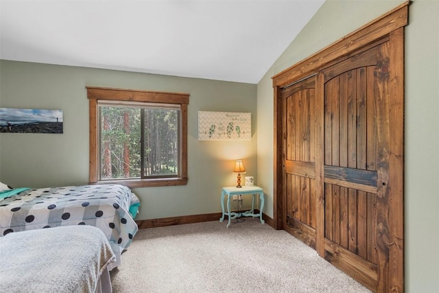 554 Lakeview Dr, Breckenridge, CO 80424 - bedroom with carpet flooring, lofted ceiling, and baseboards
