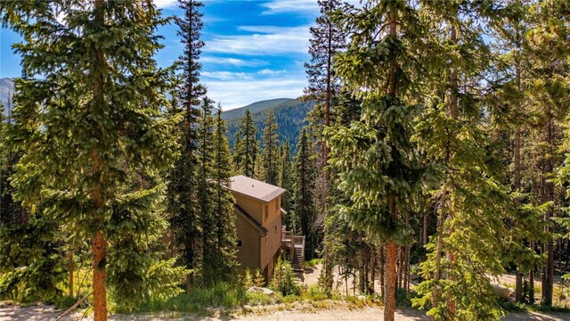 554 Lakeview Dr, Breckenridge, CO 80424 - mountain view featuring a heavily wooded area