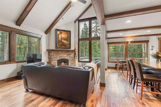 554 Lakeview Dr, Breckenridge, CO 80424 - living area with baseboards, plenty of natural light, light wood-style floors, a stone fireplace, and recessed lighting