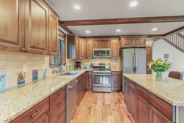 554 Lakeview Dr, Breckenridge, CO 80424 - kitchen featuring stainless steel appliances, light wood-style flooring, a sink, light stone counters, and beamed ceiling