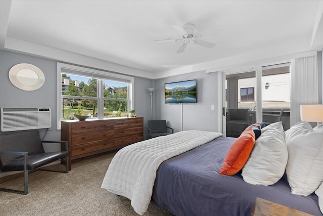 1855 Ski Time Square Dr Unit 308, Steamboat Springs, CO 80487 - carpeted bedroom featuring an AC wall unit and a ceiling fan