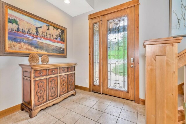 1250 Harwig Cir, Steamboat Springs, CO 80487 - entrance foyer featuring baseboards and light tile patterned flooring