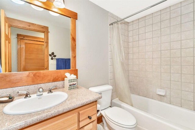 1250 Harwig Cir, Steamboat Springs, CO 80487 - full bath with toilet, vanity, and shower / bathtub combination with curtain