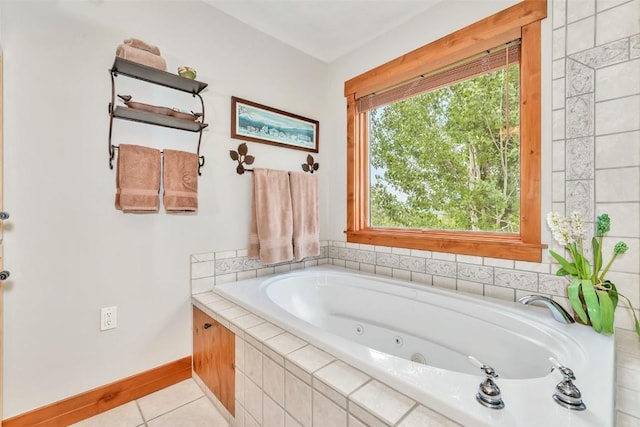 1250 Harwig Cir, Steamboat Springs, CO 80487 - bathroom featuring tile patterned flooring, a whirlpool tub, and baseboards