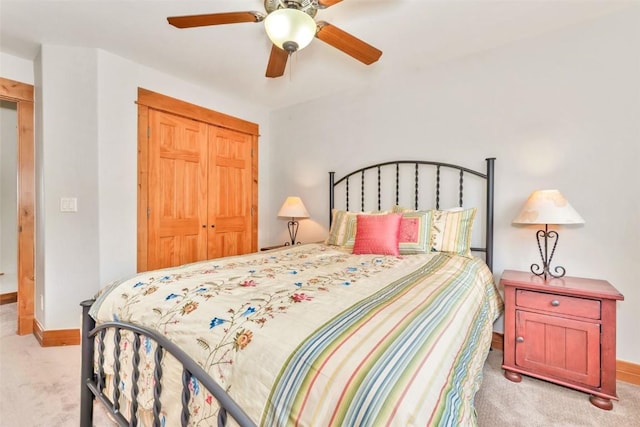 1250 Harwig Cir, Steamboat Springs, CO 80487 - bedroom with carpet flooring, a closet, baseboards, and a ceiling fan