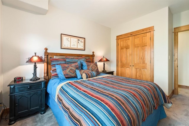 1250 Harwig Cir, Steamboat Springs, CO 80487 - bedroom with light carpet, baseboards, and a closet
