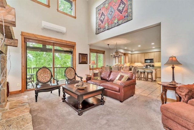 1250 Harwig Cir, Steamboat Springs, CO 80487 - living area with a towering ceiling, a wall unit AC, a chandelier, light tile patterned flooring, and recessed lighting