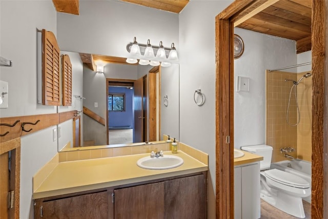 31500 Runaway Pl Unit 308, Steamboat Springs, CO 80487 - full bathroom featuring bathing tub / shower combination, wooden ceiling, vanity, and toilet