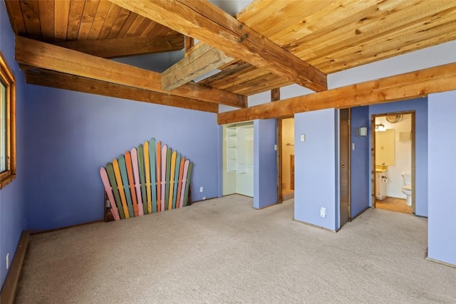 31500 Runaway Pl Unit 308, Steamboat Springs, CO 80487 - unfurnished bedroom featuring wooden ceiling, carpet flooring, and beam ceiling
