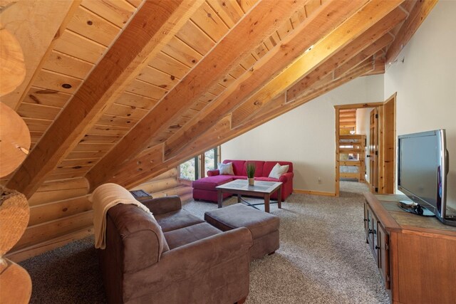 380 Darby Dr, Silverthorne, CO 80498 - living room featuring baseboards, vaulted ceiling with beams, carpet flooring, and wooden ceiling