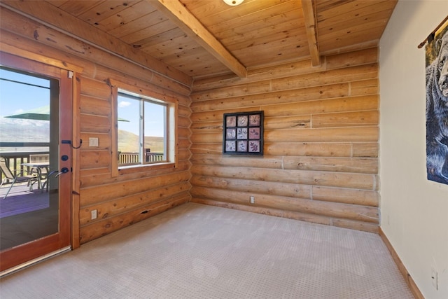 380 Darby Dr, Silverthorne, CO 80498 - carpeted empty room featuring wooden ceiling, baseboards, log walls, and beam ceiling