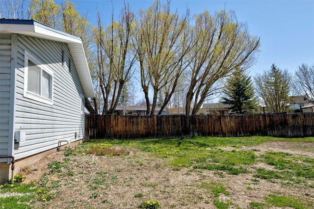 view of yard featuring fence