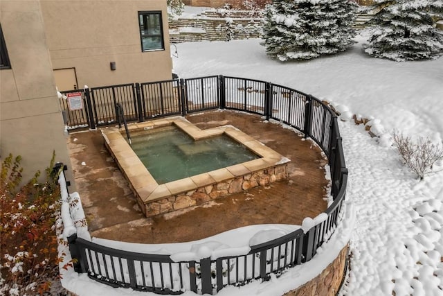 view of snow covered pool