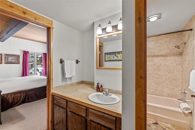 full bathroom with shower / washtub combination, ensuite bath, and vanity