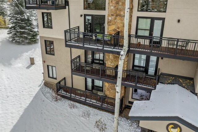 view of snow covered property