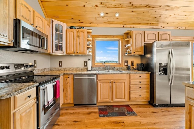 188 June Grass Ct, Fairplay, CO 80440 - kitchen with appliances with stainless steel finishes, wood ceiling, open shelves, light brown cabinetry, and light wood-style floors