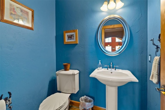 188 June Grass Ct, Fairplay, CO 80440 - half bath featuring toilet and baseboards