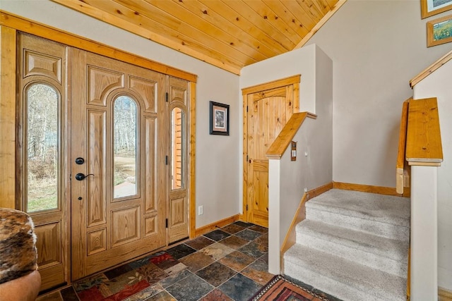 188 June Grass Ct, Fairplay, CO 80440 - foyer entrance featuring dark stone finish flooring and stairway