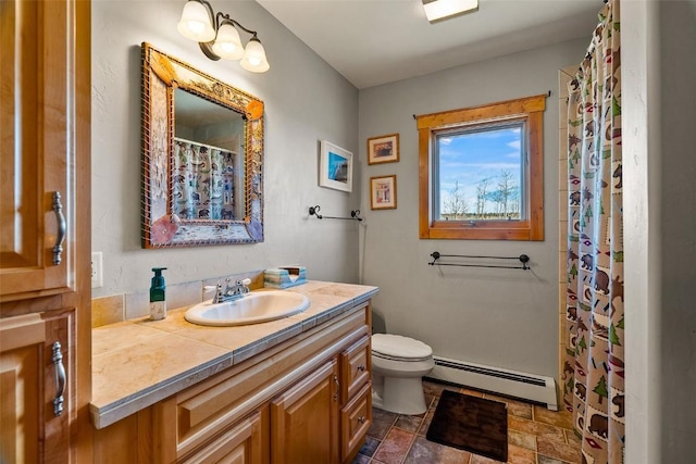 188 June Grass Ct, Fairplay, CO 80440 - bathroom with a baseboard heating unit, vanity, and stone finish flooring