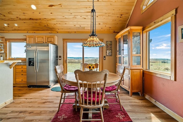 188 June Grass Ct, Fairplay, CO 80440 - dining space with wood ceiling, healthy amount of natural light, light wood-style floors, lofted ceiling, and recessed lighting