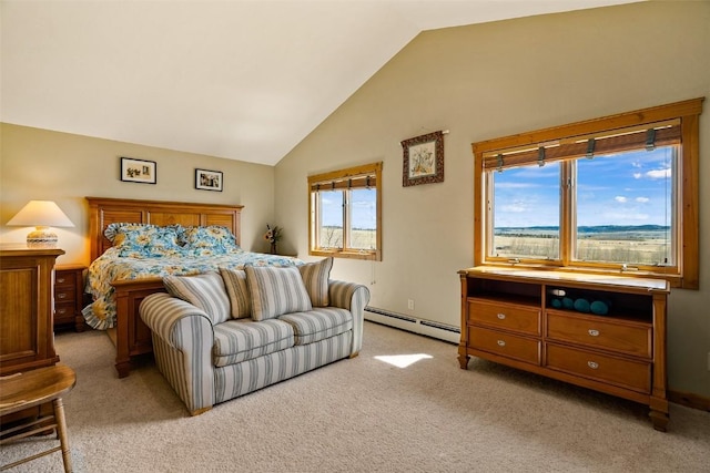 188 June Grass Ct, Fairplay, CO 80440 - bedroom with vaulted ceiling, a baseboard radiator, and light colored carpet