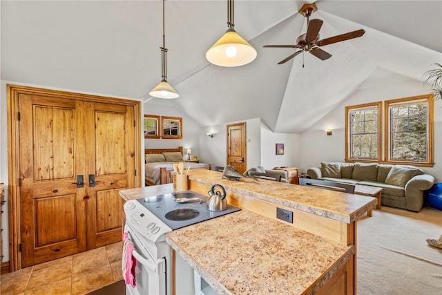 32855 More Ln, Steamboat Springs, CO 80487 - kitchen featuring white range with electric cooktop, open floor plan, light countertops, vaulted ceiling, and a ceiling fan