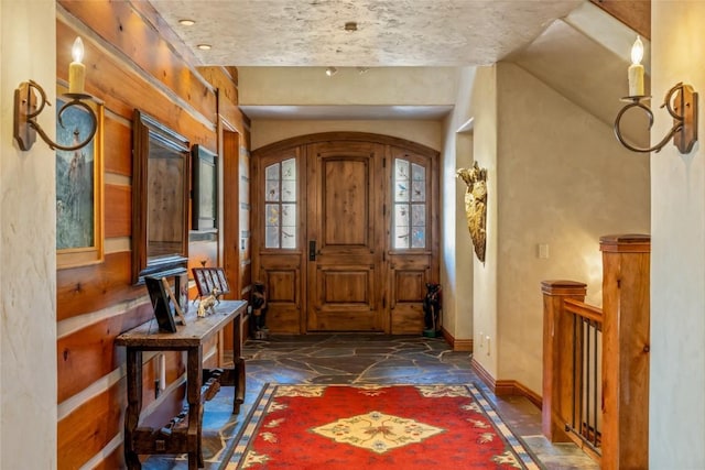 32855 More Ln, Steamboat Springs, CO 80487 - foyer entrance featuring stone floors and baseboards