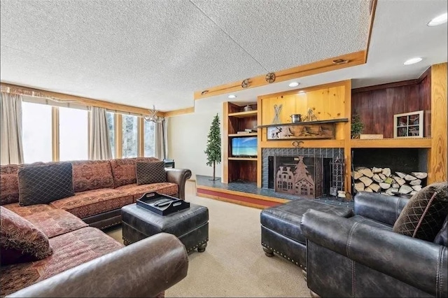 living room featuring recessed lighting, a fireplace, carpet floors, and a textured ceiling