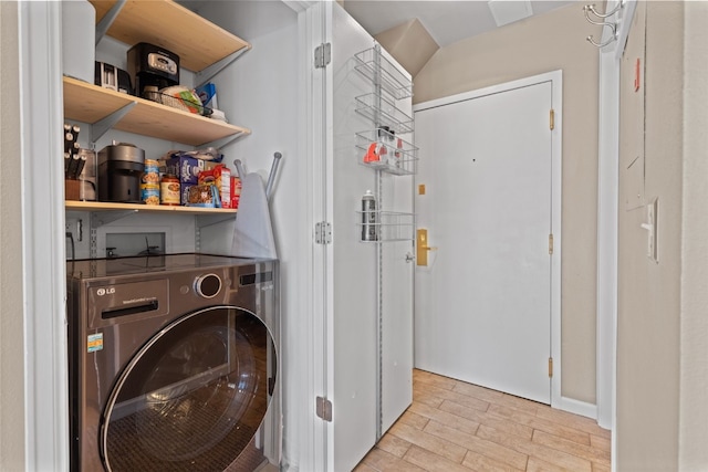 100 S Park Ave Unit E321, Breckenridge, CO 80424 - washroom featuring washer / dryer and light wood-style floors