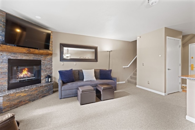 100 S Park Ave Unit E321, Breckenridge, CO 80424 - carpeted living room featuring a fireplace and stairs