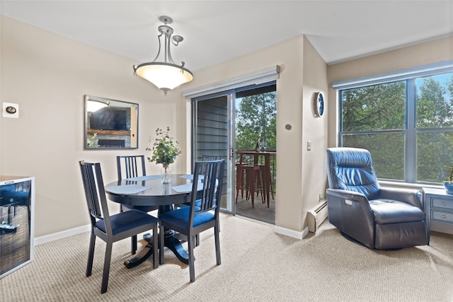 100 S Park Ave Unit E321, Breckenridge, CO 80424 - dining room featuring light carpet and a baseboard radiator