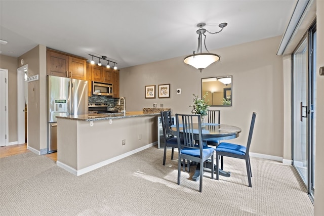 100 S Park Ave Unit E321, Breckenridge, CO 80424 - dining area with light carpet and track lighting