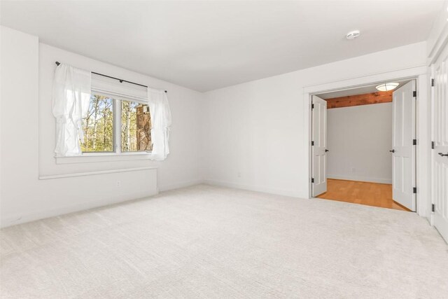 31820 Bradley Rnch, Steamboat Springs, CO 80487 - unfurnished room featuring light colored carpet and a smoke detector