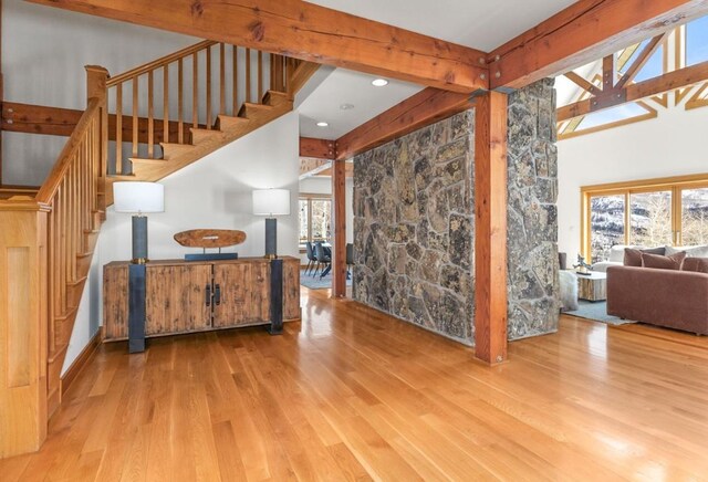 31820 Bradley Rnch, Steamboat Springs, CO 80487 - living area with wood finished floors, stairs, and beamed ceiling