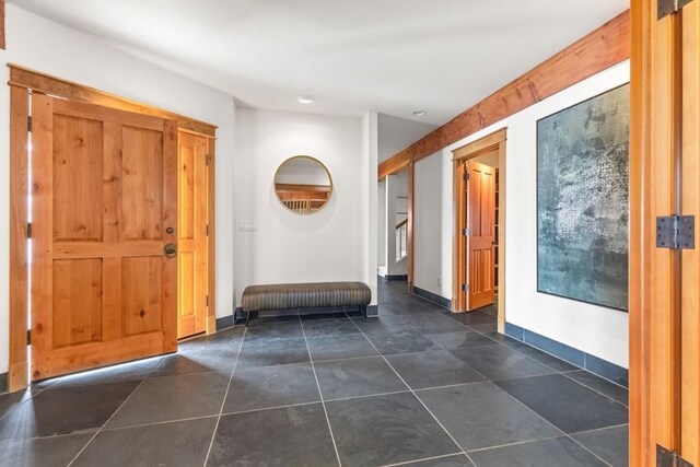 31820 Bradley Rnch, Steamboat Springs, CO 80487 - living area with wood finished floors, stairs, and beamed ceiling