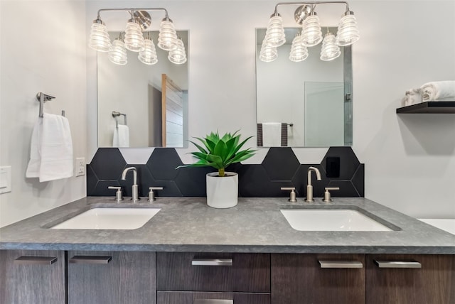 427 Whispering Pines Cir, Blue River, CO 80424 - full bathroom with double vanity and decorative backsplash