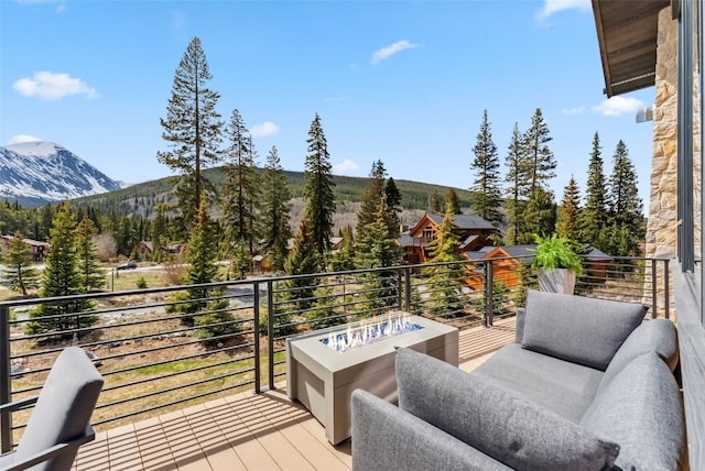 427 Whispering Pines Cir, Blue River, CO 80424 - wooden deck featuring a mountain view