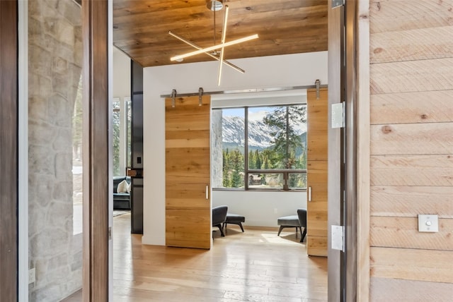 427 Whispering Pines Cir, Blue River, CO 80424 - hallway with hardwood / wood-style floors and wooden ceiling
