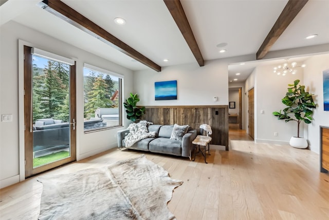 427 Whispering Pines Cir, Blue River, CO 80424 - living area with light wood-style flooring, baseboards, beam ceiling, recessed lighting, and a chandelier